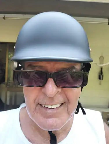 Man wearing a beanie half helmet from beaniehelmets.com and sunglasses.